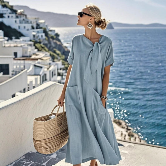 Flattering Flowing Dress with Wide Hem and Bow